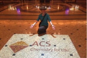 Dena with the ACS logo