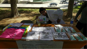 Jon selling chemistry shirts and midterm survival kits at the Club Activities Fair.