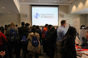 group[ of people standing in crowded room