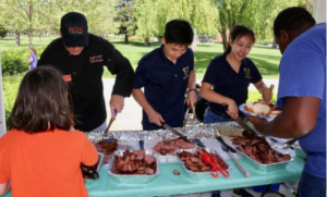 People serving steak